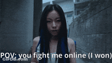 Woman With Long Black Hair Saying You Fight Me Online GIF