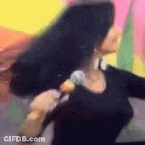 Woman With Long Black Hair Singing GIF