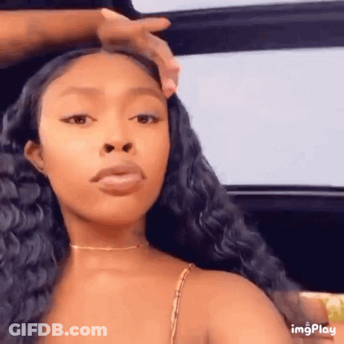 Woman With Long Black Hair Sitting In Car Person Touching Hair GIF