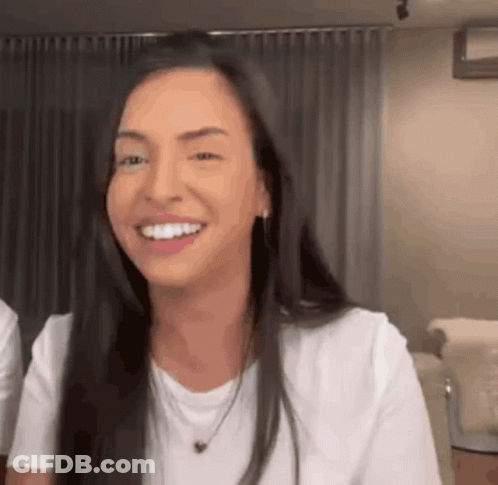 Woman With Long Black Hair Smiling GIF