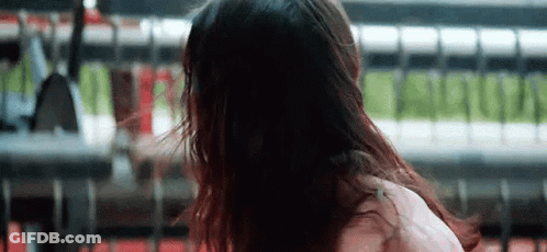 Woman With Long Black Hair Standing GIF