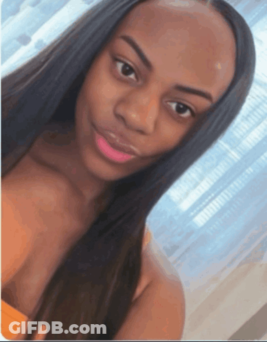 Woman With Long Black Hair Taking Picture GIF