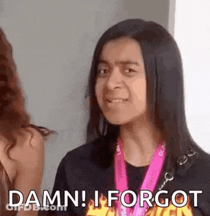 Woman With Long Black Hair Wearing Medal Making Funny Face GIF