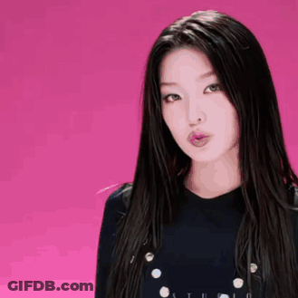 Woman With Long Black Hair Wearing Studio Shirt GIF