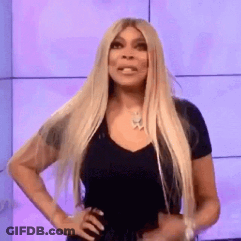 Woman With Long Blonde Hair Hands On Hips Funny Face GIF