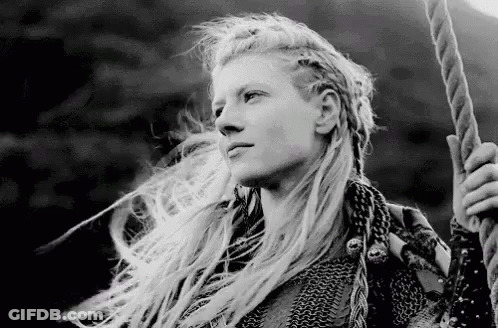 Woman With Long Blonde Hair Holding Rope GIF