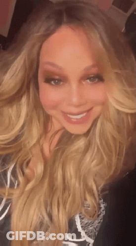 Woman With Long Blonde Hair Smiling GIF