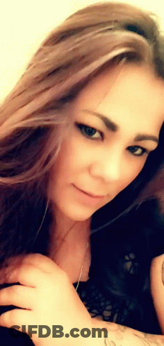 Woman With Long Brown Hair And Tattoo GIF