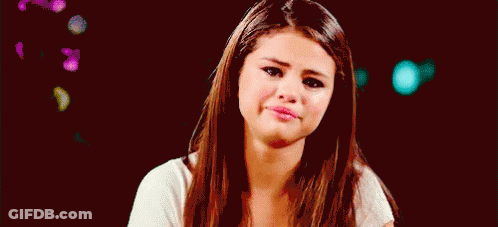 Woman With Long Brown Hair Smiling Making Funny Face GIF