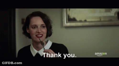 Woman With Long Curly Hair Before Men GIF