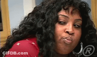 Woman With Long Curly Hair Blowing Kiss GIF