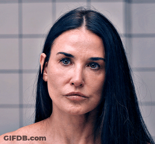 Woman With Long Dark Hair Close Up GIF