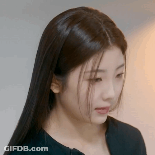 Woman With Long Dark Hair Close Up GIF