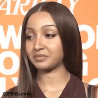 Woman With Long Dark Hair Making Funny Face GIF