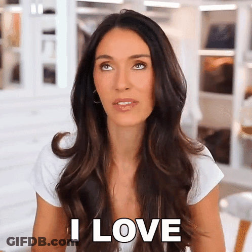 Woman With Long Dark Hair Sitting In Front Of Closet I Love GIF