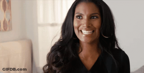 Woman With Long Dark Hair Smiling GIF