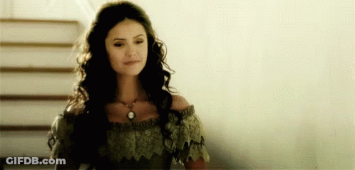 Woman With Long Dark Hair Standing GIF