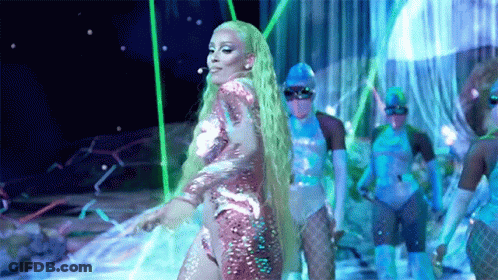Woman With Long Green Hair Dancing On Stage GIF