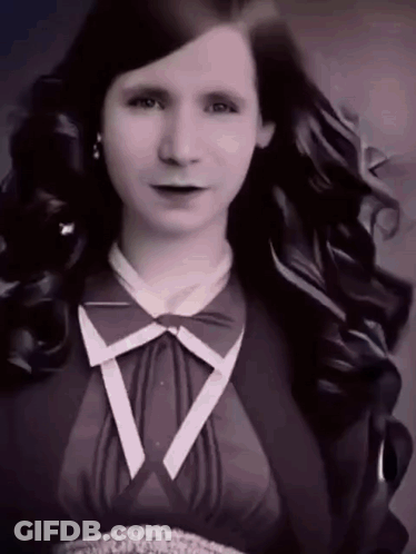 Woman With Long Hair And Bow Tie GIF