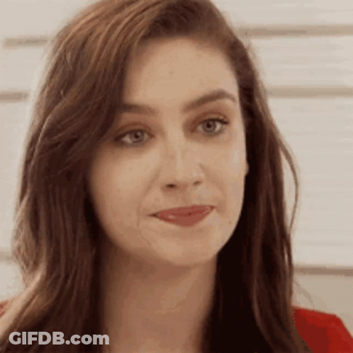 Woman With Long Hair And Red Shirt Close Up GIF