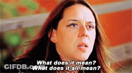 Woman With Long Hair Asking What Does It Mean GIF