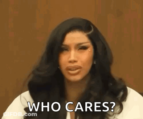 Woman With Long Hair Asking Who Cares GIF