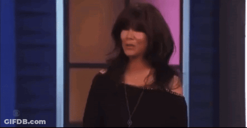 Woman With Long Hair Bangs Blue Wall Stage GIF