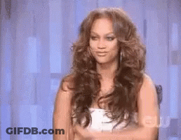 Woman With Long Hair Blue Wall GIF