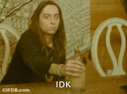 Woman With Long Hair Holding Bottle Saying IDK GIF