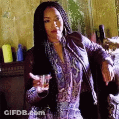 Woman With Long Hair Holding Whiskey GIF