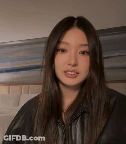 Woman With Long Hair In Black Jacket GIF