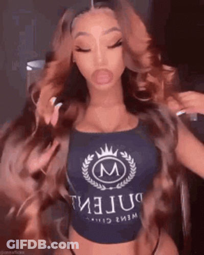 Woman With Long Hair In Crop Top And Crown GIF