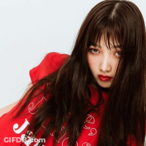 Woman With Long Hair In Red Shirt Saying J GIF