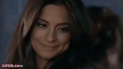 Woman With Long Hair Making Funny Face GIF