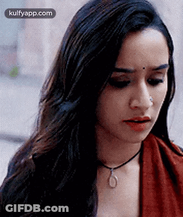 Woman With Long Hair, Nose Ring, Red Top, Necklace GIF