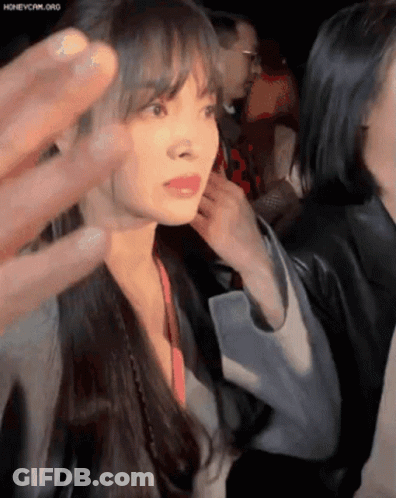 Woman With Long Hair Touched By Hand GIF