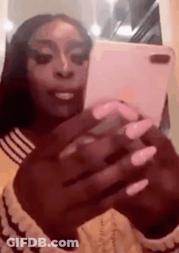 Woman With Long Nails Taking Selfie GIF