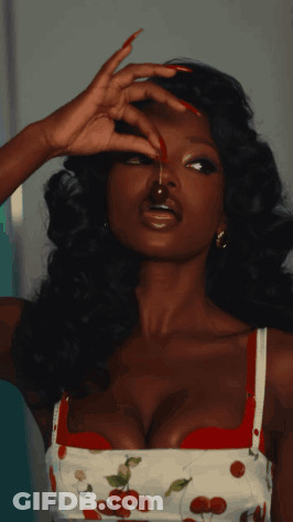 Woman With Long Red Nails And Cherry Dress GIF