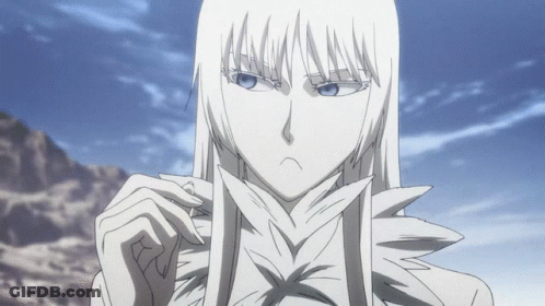 Woman With Long White Hair And Blue Eyes In Front Of Mountains GIF