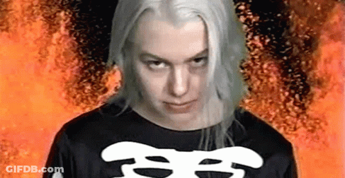 Woman With Long White Hair And Skeleton Shirt GIF