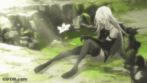Woman With Long White Hair Sitting On Rock Near Flower GIF