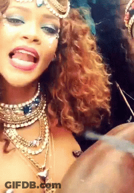 Woman With Many Necklaces And Earrings Making Funny Face GIF