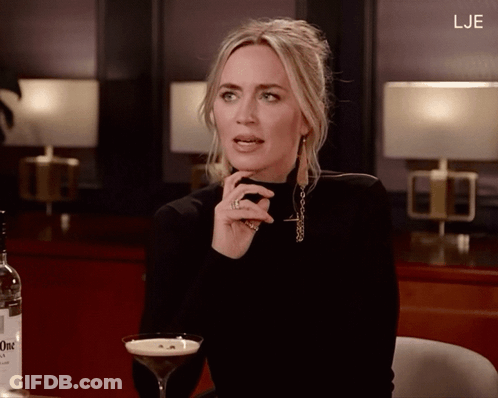 Woman With Martini Glass And Bottle Of Gin GIF