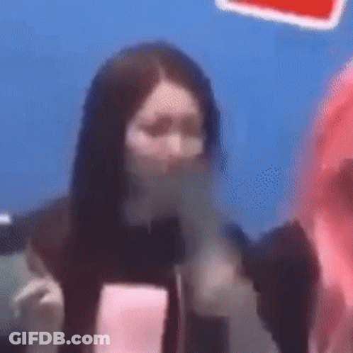 Woman With Mask At Microphone GIF