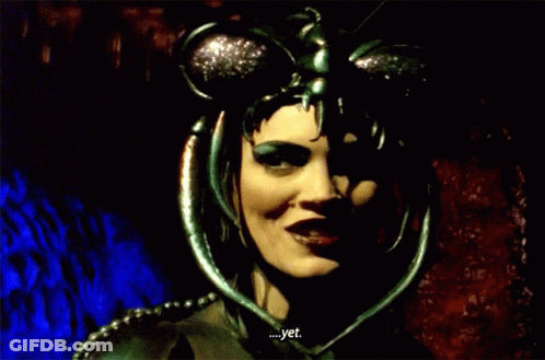 Woman With Mask On Head Smiling Says Yet GIF