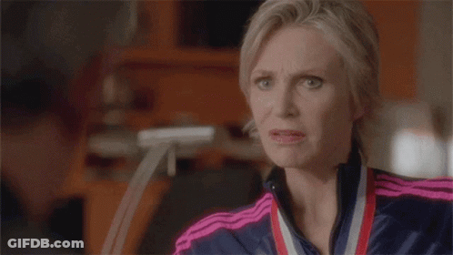 Woman With Medal Making A Face GIF