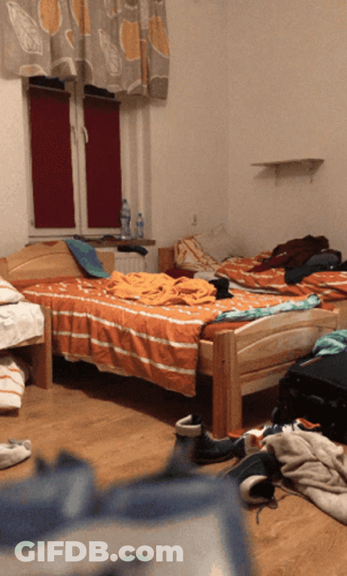 Woman With Messy Bedroom GIF