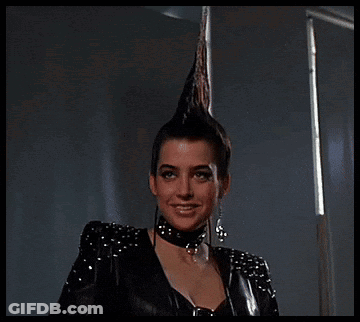 Woman With Mohawk Holding Scissors Saying Im Bad GIF
