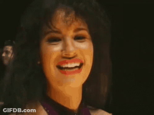 Woman With Mouth Open Waving Hand GIF