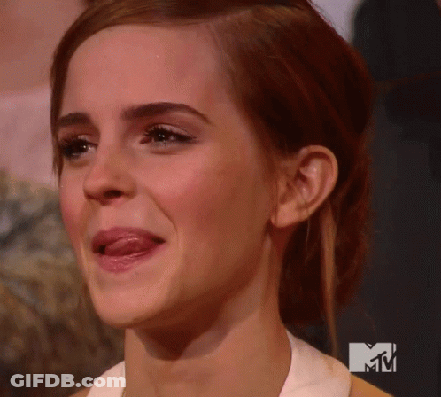 Woman With MTV Logo Behind Her GIF